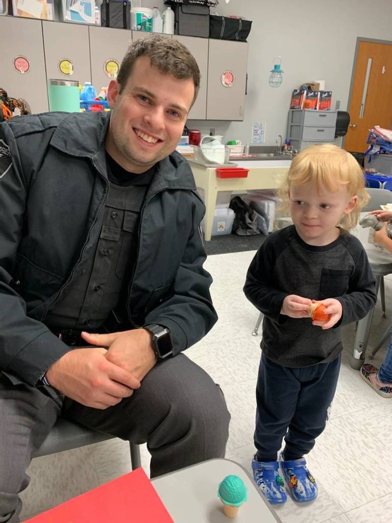 Officer with Pre-K student